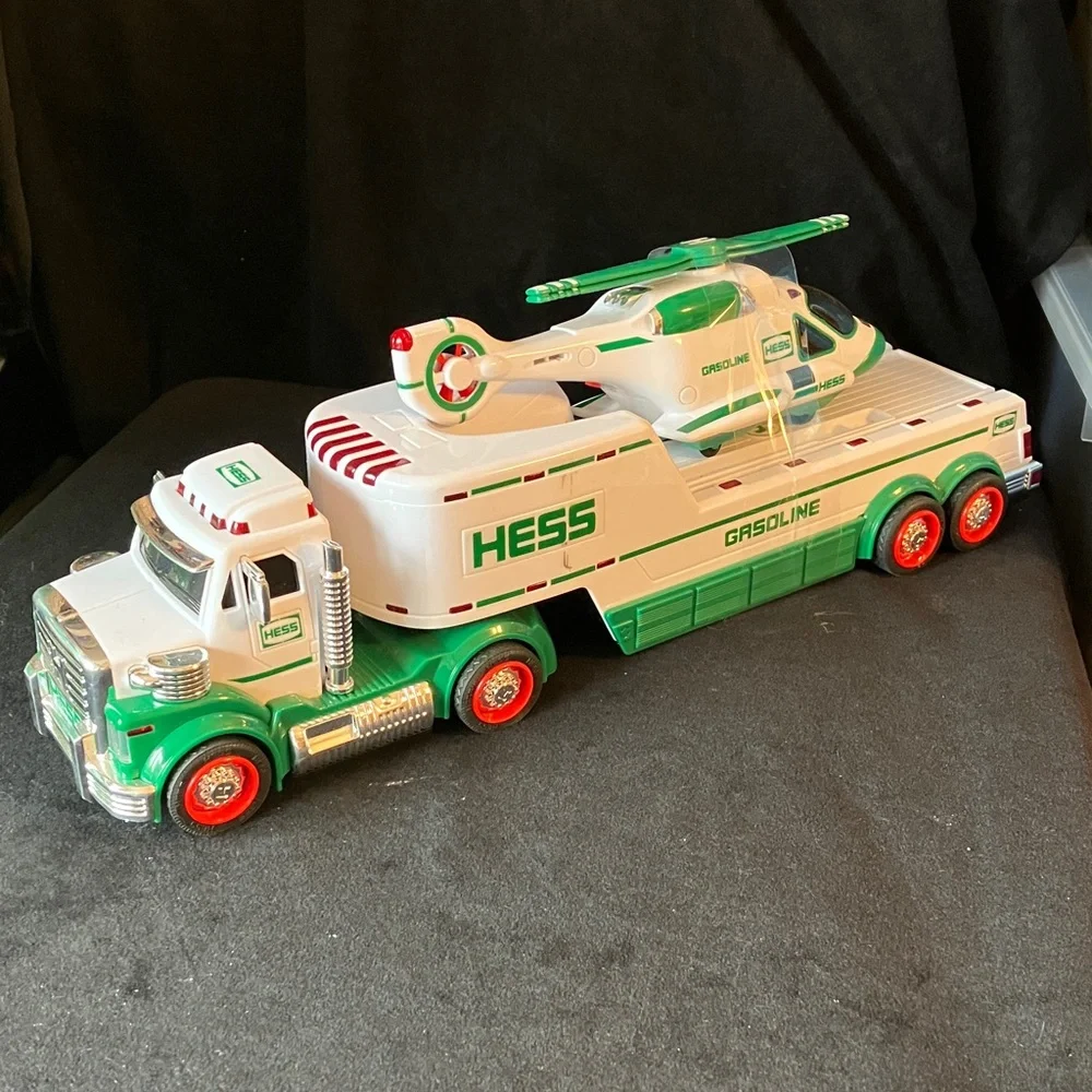 HESS Gasoline Semi Truck carrying helicopter Toy 2010 Toy plays sounds